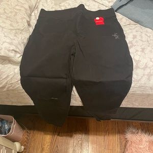 BNWT black jeans. Lightly distressed…hole on left knee, by design